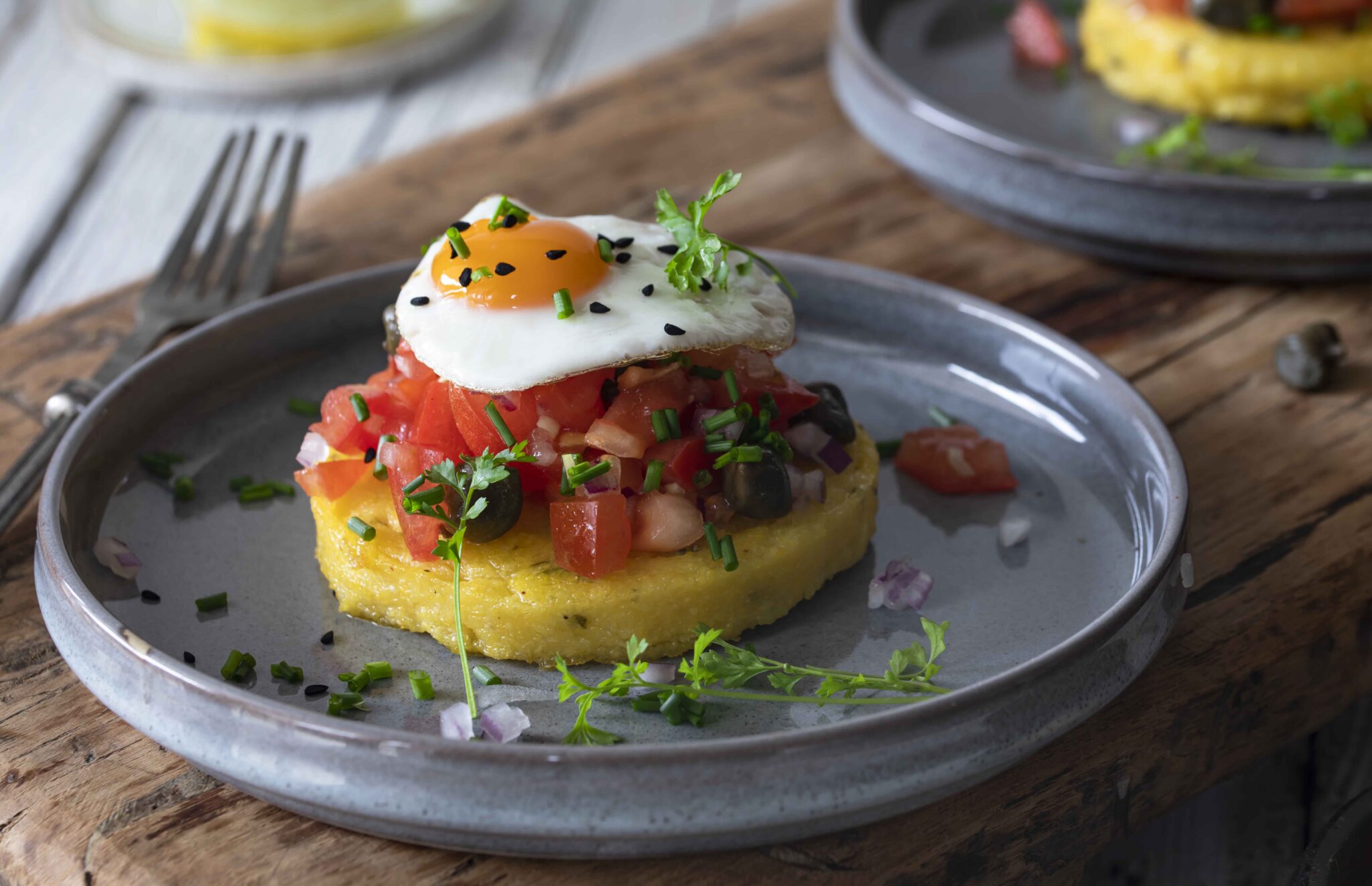 Polenta toast with tomato and quail egg Secretos Del Sur