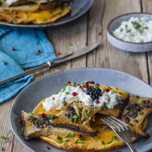 Omelet met gebakken boletus, truffel crème, cottage cheese en truffelkaviaar