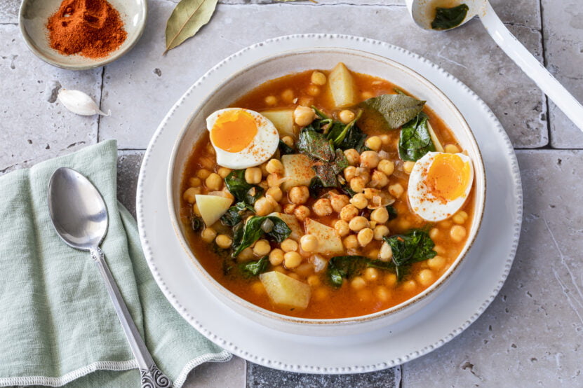Meal soup with chickpeas, spinach and egg